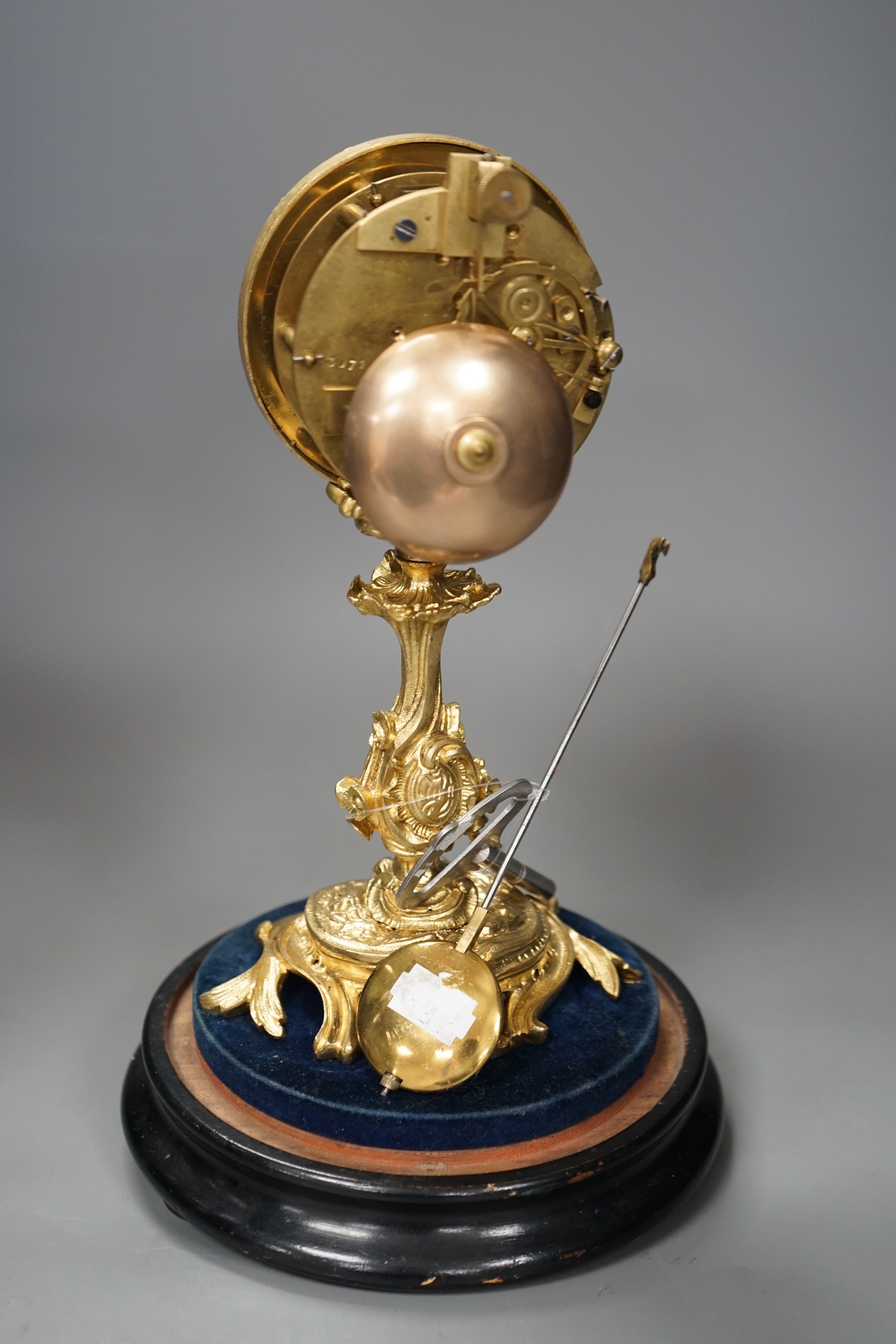 A French Grignon-Meusnier of Paris ormolu clock under dome, with key and pendulum